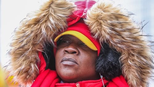 Carolyn Williams is bundled up Thursday in Five Points. JOHN SPINK / JSPINK@AJC.COM