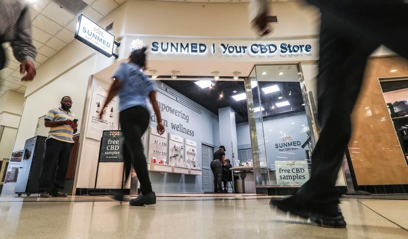 Aug. 31, 2023 Atlanta: Sunmed | Your CBD Store has opened at Hartsfield-Jackson International Airport. Such products are already sold in stores across Georgia but state officials emphasize that the FDA still prohibits the use of CBD oil in food and dietary supplements. CBD is derived from hemp, a cousin of the marijuana plant that only contains a trace amount of THC. THC is what gives marijuana users a high. But the CBD products won’t be cheap. Changing laws that vary by state and differing levels of enforcement depending on the jurisdiction create gray areas for CBD particularly for travel. (John Spink / John.Spink@ajc.com)



