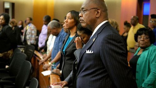 Fulton County District Attorney Paul Howard stands as the jury comes back into the courtroom before Senior Assistant DA Clint Rucker gives the state's final arguments Wednesday afternoon. The courtroom was packed to capacity for the final closing arguments in the Atlanta Public Schools test-cheating trial. (Atlanta Journal-Constitution, Kent D. Johnson, Pool)