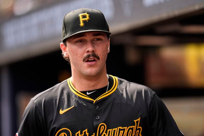 Pittsburgh Pirates pitcher Paul Skenes (30) walks in the dugout in the third inning of a baseball game against the Atlanta Braves, Saturday, June 29, 2024, in Atlanta. (AP Photo/Mike Stewart)