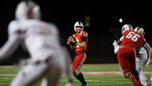 Archer's Caleb Peevy (10) prepares to throw the ball during a GHSA high school football playoff game between the Archer Tigers and the Walton Raiders at Archer High School in Lawrenceville, GA., on Friday, November 19, 2021. (Photo/Jenn Finch)