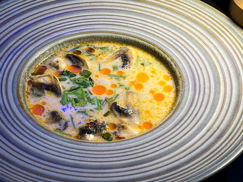 Tom kha soup can be ordered with chicken, shrimp, tofu or mushrooms at Bar of Thailand. Henri Hollis/henri.hollis@ajc.com