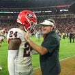 Georgia head coach Kirby Smart greets Georgia defensive back Malaki Starks (24) after their loss to Alabama at Bryant-Denny Stadium, Saturday, Sept. 28, 2024, in Tuscaloosa, Al. Alabama won 41-34. (Jason Getz / AJC)

