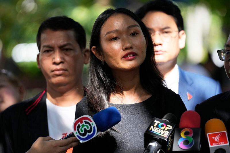 Lawmaker of Move Forward Party Chonthicha Jangrew speaks to reporters on her arrival at the Thanyaburi Provincial Court in Pathum Thani province, north of Bangkok, Thailand, Monday, May 27, 2024. The Thai court on Monday sentenced the lawmaker from the progressive opposition party to two years in prison after finding her guilty of defaming the monarchy in a speech she made during a protest rally three years ago. (AP Photo/Sakchai Lalit)