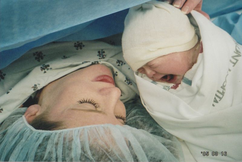 Betsy Glass holds daughter Darden after her birth in 2005. (Contributed)