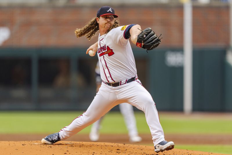 Atlanta Braves pitcher Grant Holmes throws in the second inning of the second baseball game of a doubleheader against the New York Mets, Monday, Sept. 30, 2024, in Atlanta. (AP Photo/Jason Allen)