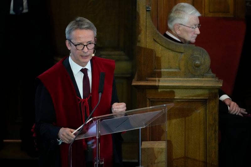 Rector Luc Sels delivers his speech during Pope Francis' meeting with the professors in the Promotiezaal of the Catholic University of Leuven, Belgium, Friday, Sept. 27, 2024. (AP Photo/Andrew Medichini)