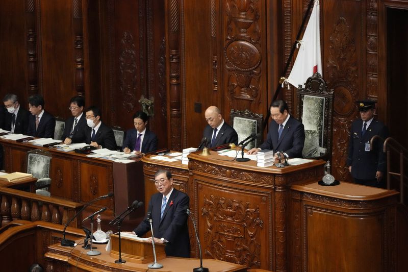 Japanese Prime Minister Shigeru Ishiba delivers his first policy speech during a Diet session at the Lower House of the Parliament Friday, Oct. 4, 2024, in Tokyo. (AP Photo/Eugene Hoshiko)