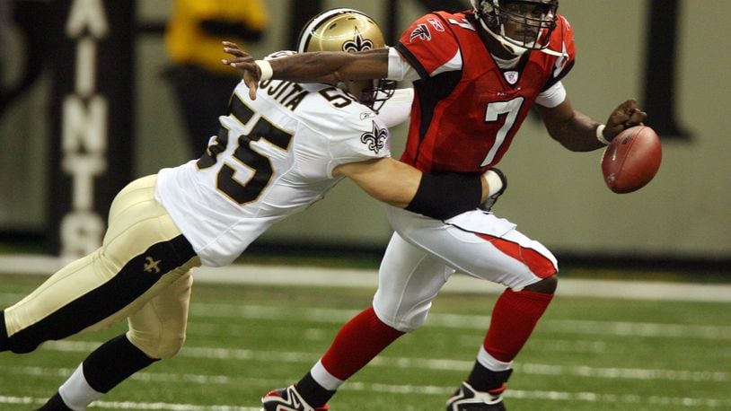 Tampa Bay contains Vick, batters Falcons