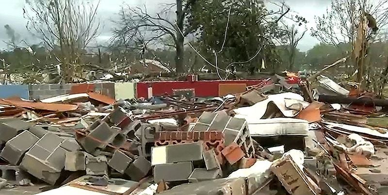 At least one radar-confirmed tornado caused severe damage in west Georgia Sunday morning, leaving at least five people injured and others trapped in homes as trees were uprooted and toppled onto houses and vehicles. (Channel 2 Action News)