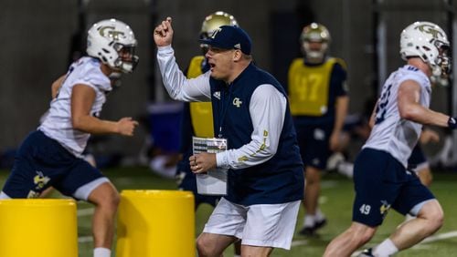 New Georgia Tech coach Geoff Collins practices his exhortations at the start of spring drills. (Photo by Danny Karnik/Georgia Tech)