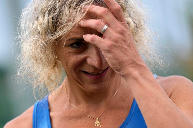 Italy's Valentina Petrillo gestures during an interview with The Associated Press in Pieve di Cento, near Bologna, Italy, Monday, Aug. 19, 2024. Valentina Petrillo is set to become the first transgender woman to compete at the Paralympic Games at the end of this month in Paris. (AP Photo/Antonio Calanni)