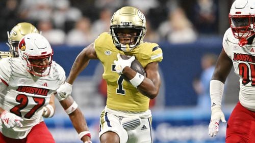 Chase Lane scores on a 48-yard touchdown catch against Louisville in the 2023 season opener.