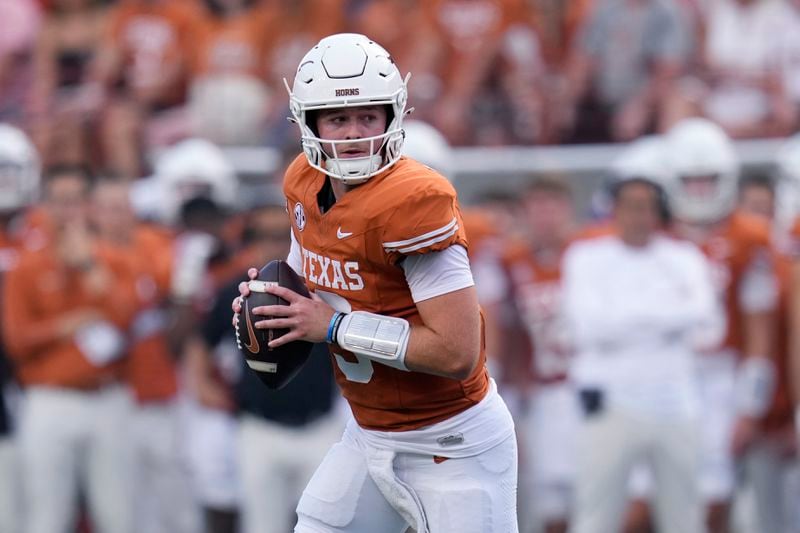 Texas quarterback Quinn Ewers (3) looks to pass against UTSA during the first half of an NCAA college football game in Austin, Texas, Saturday, Sept. 14, 2024. (AP Photo/Eric Gay)