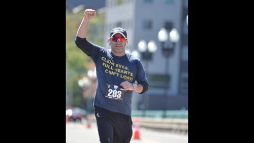 AJC president and publisher Andrew Morse takes part in the Knoxville Marathon. Courtesy of Andrew Morse