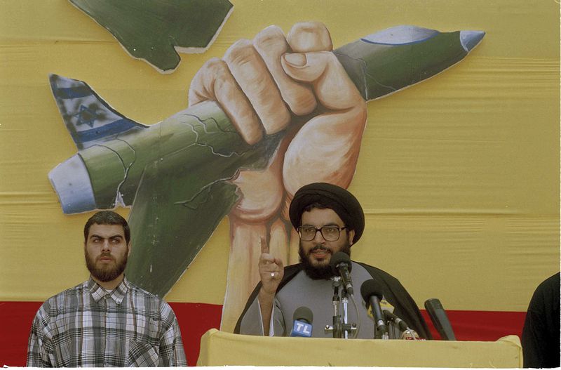 FILE - Hassan Nasrallah, leader of Hezbollah, speaks during a ceremony in Beirut on July 24, 1994, marking the first anniversary of the weeklong Israeli blitz on south Lebanon. (AP Photo/Ahmed Azakir, File)