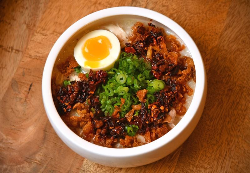 Dakjuk, a savory Korean porridge, has been a comfort food for Spring restaurant chef-owner Brian So since childhood. (CHRIS HUNT FOR THE ATLANTA JOURNAL-CONSTITUTION)