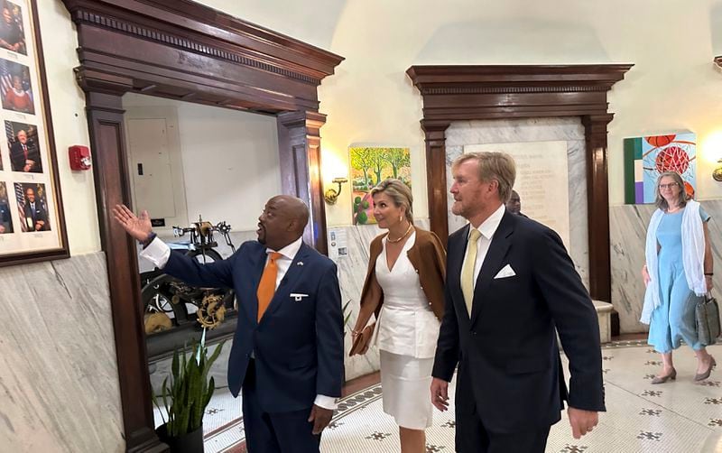 King Willem-Alexander (right) and Queen Maxima (center) of the Netherlands get a tour of City Hall in Savannah from Mayor Van Johnson (left) on Tuesday.