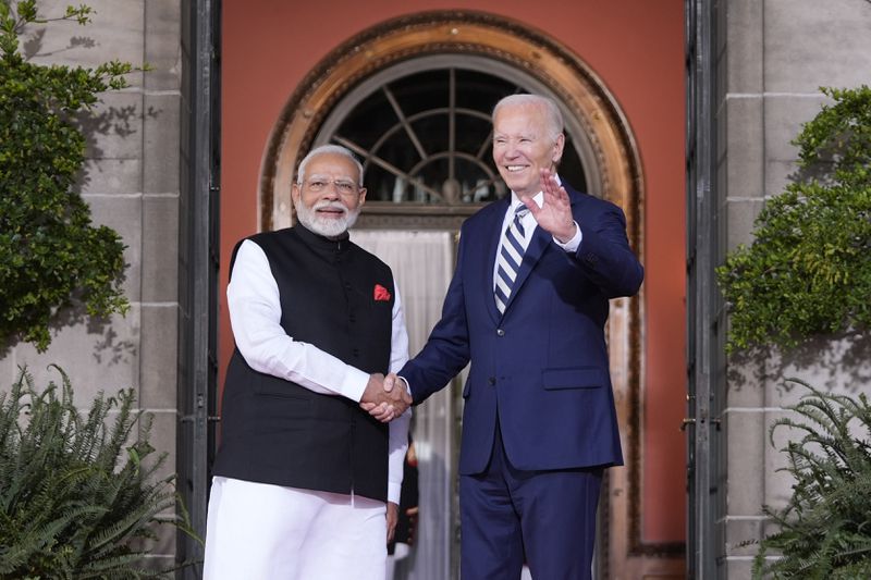 President Joe Biden greets India's Prime Minister Narendra Modi at the Quad leaders summit at Archmere Academy in Claymont, Del., Saturday, Sept. 21, 2024. (AP Photo/Mark Schiefelbein)