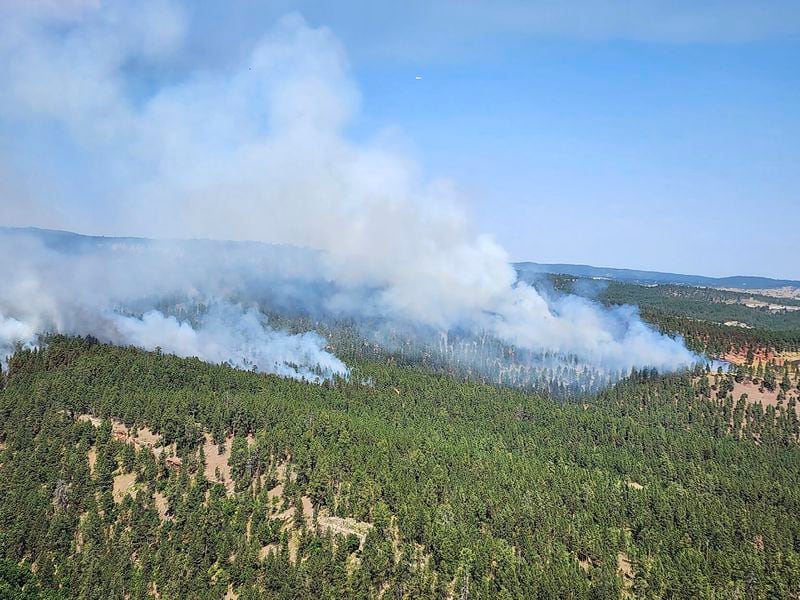 Smoke spreads from the First Thunder Fire, Tuesday, Sept. 3, 2024 near Rapid City, N.D. (Madison Willis/Rapid City Journal via AP)