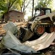 Debris left in the aftermath of Hurricane Helene is cleared Saturday, Oct. 5, 2024, in Del Rio, Tenn. (AP Photo/Jeff Roberson)