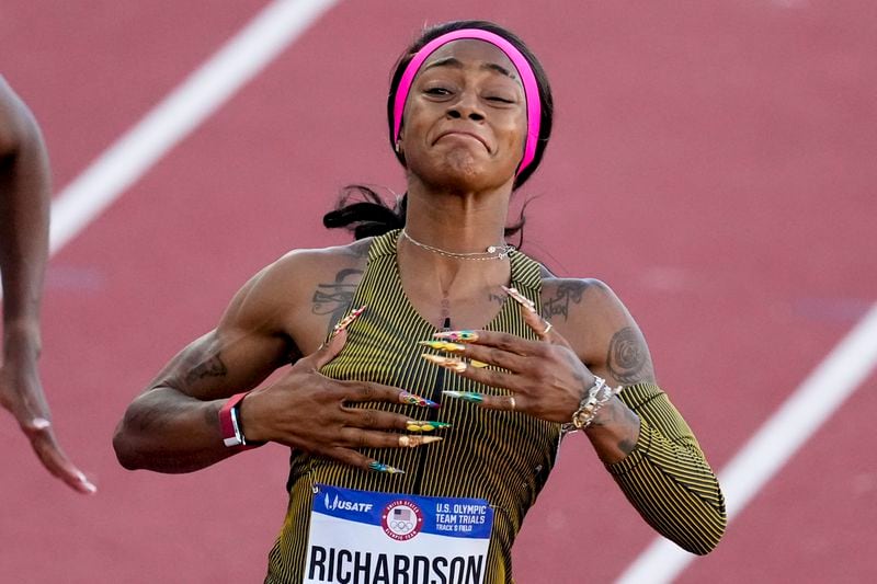 FILE - Sha'Carri Richardson celebrates her win in the wins women's 100-meter run final during the U.S. Track and Field Olympic Team Trials Saturday, June 22, 2024, in Eugene, Ore. Richardson makes her Olympic debut after her much-discussed and debated absence from the last Olympics due to a positive marijuana test. (AP Photo/Chris Carlson, File)