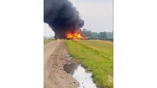 FILE - This photo provided by Doug Zink shows smoke filling the sky after a train derailment, July 5, 2024, near Carrington, N.D. The fiery North Dakota derailment that burned for days early last month was the latest train crash to involve the flawed tank cars that the National Transportation Safety Board has been trying to get off the tracks for decades, according to a preliminary report released Thursday, Aug. 1. (Doug Zink via AP, File)