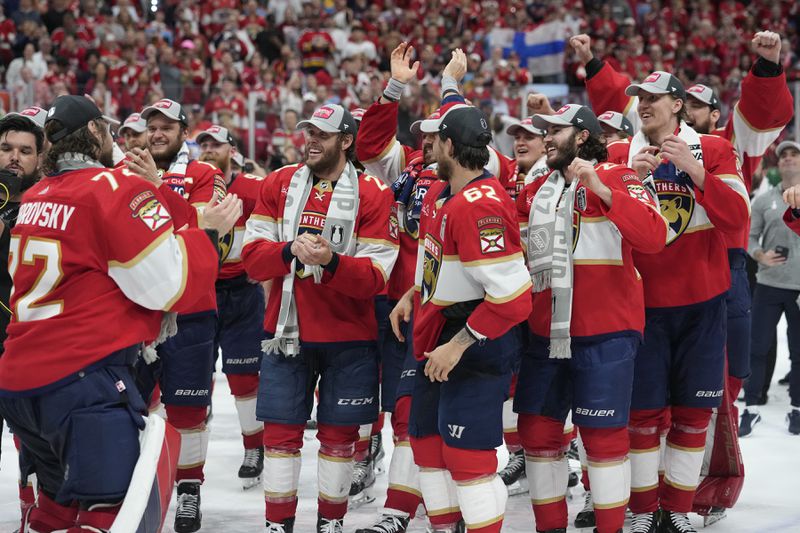 Florida Panthers goaltender Sergei Bobrovsky (72) talks to the team after winning the NHL hockey Stanley Cup over the Edmonton Oilers, Monday, June 24, 2024, in Sunrise, Fla. (AP Photo/Wilfredo Lee)