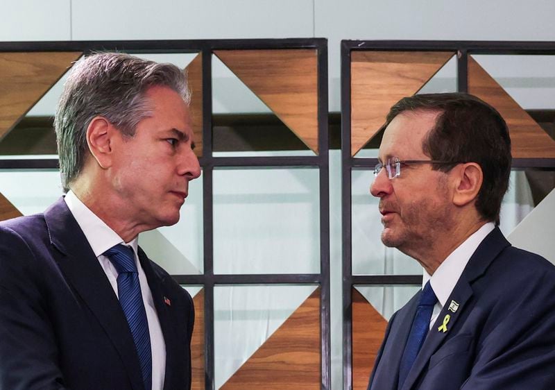 U.S. Secretary of State Antony Blinken, left, meets with Israel's President Isaac Herzog, in Tel Aviv, Israel, Monday, Aug. 19, 2024. (Kevin Mohatt/Pool Photo via AP)