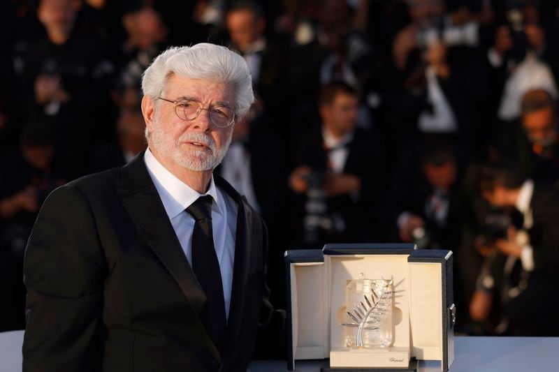George Lucas poses with the honorary Palme d'Or during the photo call following the awards ceremony at the 77th international film festival, Cannes, southern France, Saturday, May 25, 2024. (Photo by Vianney Le Caer/Invision/AP)