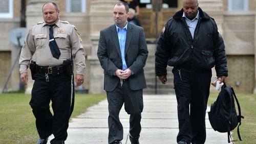 November 26, 2018 Ocilla - Ryan Alexander Duke, charged with the murder of Tara Grinstead, is escorted out after his motion hearings before Chief Judge of the Tifton Circuit Bill Reinhardt at Irwin County Courthouse in Ocilla. HYOSUB SHIN / HSHIN@AJC.COM