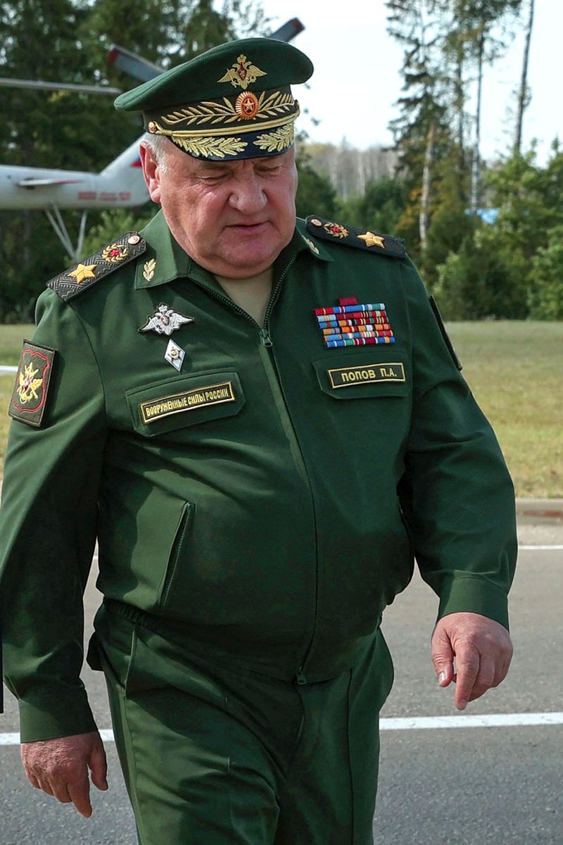 Former Russian Deputy Defense Minister Pavel Popov walks to attend the Army-2022 International Military-Technical Forum at the Russian Armed Forces' Patriot Park in Kubinka, outside Moscow, Russia, Tuesday, Aug. 16, 2022. Popov was detained on fraud charges Thursday, Russian state news agencies said in the latest high-profile arrest of a senior military official in Russia. (Ekaterina Shtukina, Sputnik Pool Photo via AP)