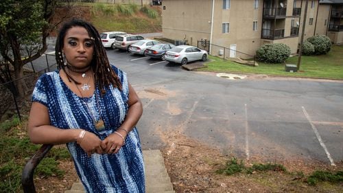 Jazmine White stands outside her Kingsley Village Apartments Saturday in Austell March 21, 2020. STEVE SCHAEFER / SPECIAL TO THE AJC