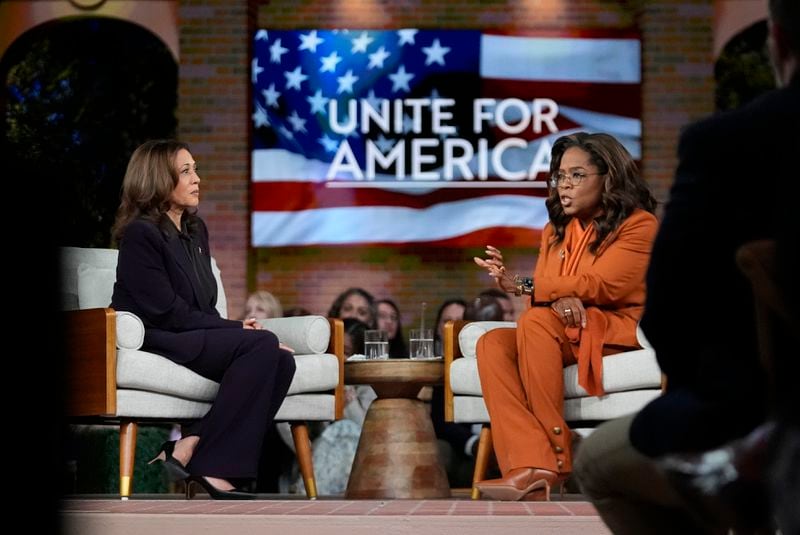 Democratic presidential nominee Vice President Kamala Harris joins Oprah Winfrey at Oprah's Unite for America Live Streaming event Thursday, Sept. 19, 2024 in Farmington Hills, Mich. (AP Photo/Paul Sancya)