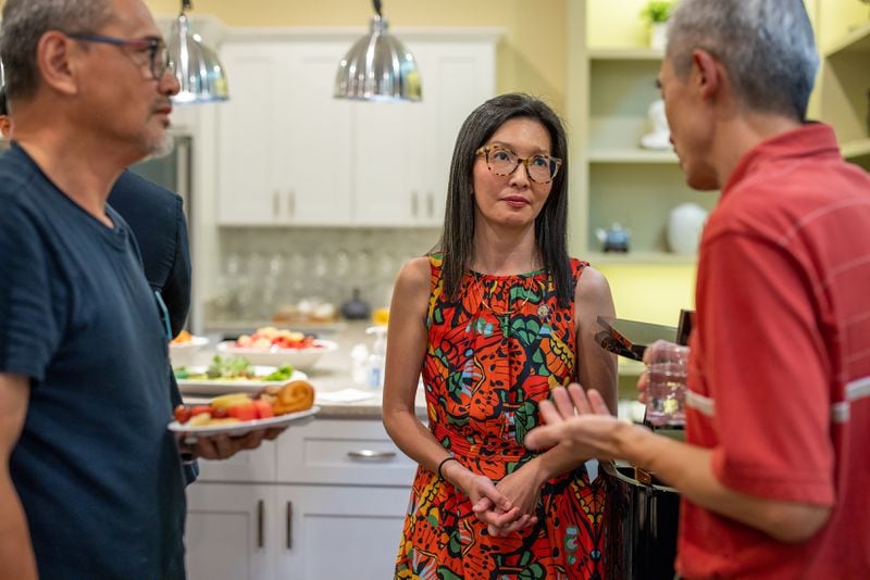 State Rep. Michelle Au (center), a Democrat who represents a competitive Johns Creek-based district, said Gov. Brian Kemp’s order to suspend the state's gas tax will “offer some short-term savings to many.” But she added that the roughly $150 million tab for the break would go a long way toward the long-held goal of expanding Medicaid.(Lynsey Weatherspoon/The New York Times)