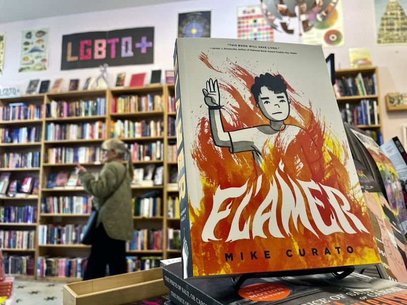 An LGBTQ+ related book is seen on display at Fabulosa Books in the Castro District of San Francisco on Thursday, June 27, 2024. "Books Not Bans" is a program initiated and sponsored by Fabulosa Books that sends boxes of LGBTQ+ books to LGBTQ+ organizations in conservative parts of America, places where bigoted politicians are demonizing and banning books with LGBTQ+ affirming content. (AP Photo/Haven Daley)