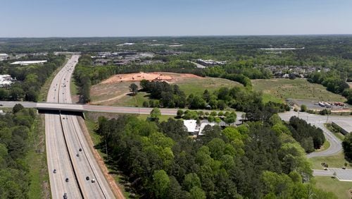 Aerial photograph shows a proposed mixed-use development and arena with the goal of bringing a NHL franchise back to metro Atlanta, along Ga. 400 (left), Tuesday, April 18, 2023, in Alpharetta. The project, called The Gathering at South Forsyth, aims to transform roughly 100 acres along Ga. 400 into an entertainment hub centered around an 18,000-seat arena. (Hyosub Shin / Hyosub.Shin@ajc.com) 