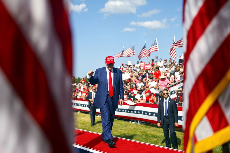 Republican presidential candidate former President Donald Trump walks off the stage after speaking at a campaign event Tuesday, June 18, 2024, in Racine, Wis. (AP Photo/Jeffrey Phelps)