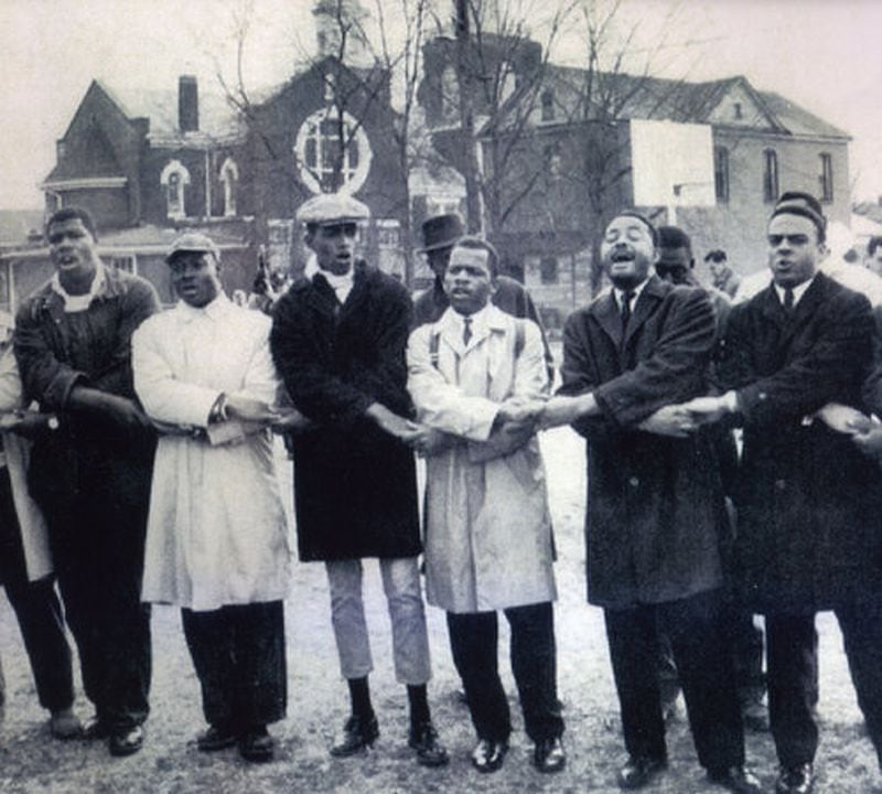 James Orange (from left), Rev. William Bolden, unidentified man, John Lewis, Hosea Williams and Andrew Young. Photo Courtesy of Rev. William Bolden.