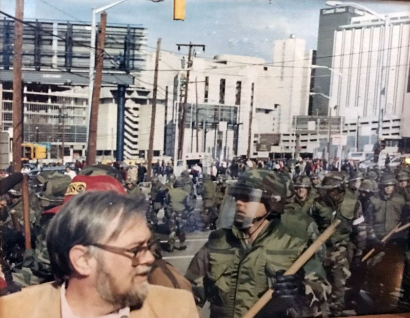 Bill Montgomery with the National Guard behind him in Atlanta the day after Dr. Martin Luther King, Jr. was assassinated. Contributed by Tracey Conner