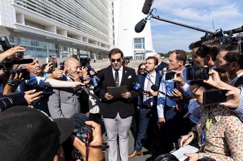 Former U.S. Rep George Santos speaks to the media outside the federal courthouse in Central Islip, N.Y. on, Monday, Aug. 19, 2024 in New York. (AP Photo/Stefan Jeremiah)