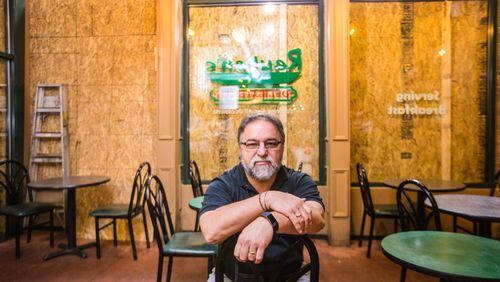 Claudio Furgiuele is the owner of Ruben’s Deli, a New York style deli on Broad Street in the Fairlie-Poplar District downtown Wednesday, June 17, 2020. Rioters broke windows throughout downtown. (Jenni Girtman for The Atlanta Journal-Constitution)