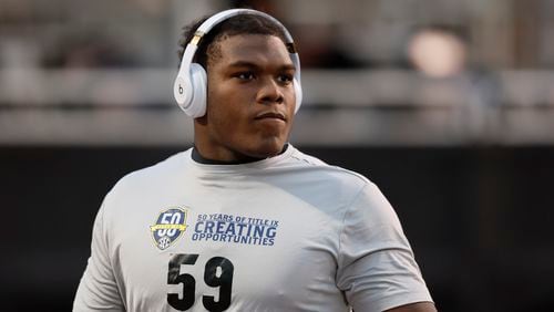 Georgia offensive lineman Broderick Jones warms-up before their game against the Mississippi State Bulldogs at Davis Wade Stadium, Saturday, November 12, 2022, in Starkville, Mississippi. Jason Getz / Jason.Getz@ajc.com)