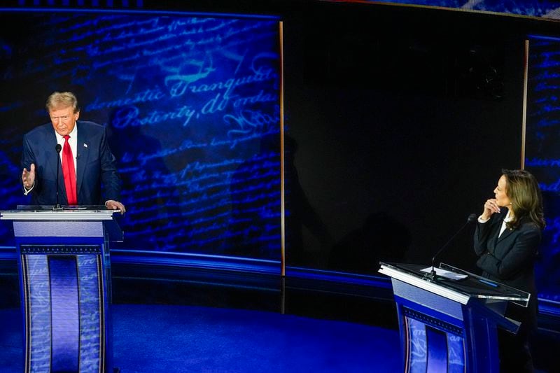 Former President Donald Trump, the Republican presidential nominee, and Vice President Kamala Harris, who heads the Democratic ticket, participate during an ABC News presidential debate Tuesday at the National Constitution Center in Philadelphia. Harris' campaign has already said it wants a second debate. (Alex Brandon/AP)