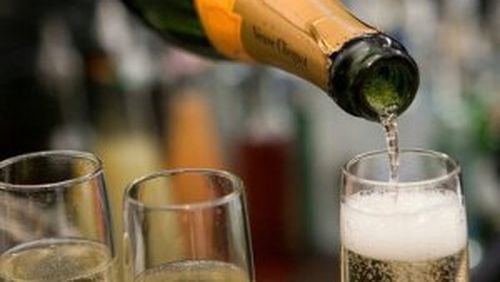 Why do we drink champagne on New Year's Eve?