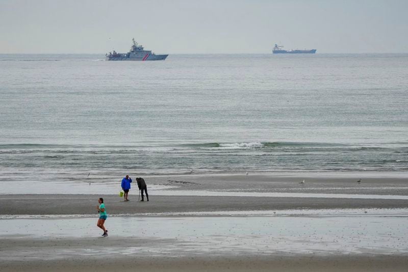 A vessel of the French Gendarmerie Nationale patrols in front of the Wimereux beach, France, Wednesday, Sept. 4, 2024. A boat carrying migrants ripped apart in the English Channel as they attempted to reach Britain from northern France on Tuesday, plunging dozens into the treacherous waterway and leaving 12 dead, authorities said. (AP Photo/Nicolas Garriga)