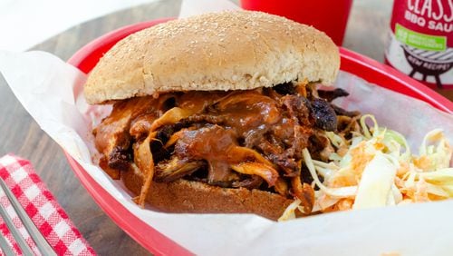 King trumpet mushrooms are roasted and tossed with zesty sauce for plant-forward Barbecue Pulled Mushroom Sandwiches. (Virginia Willis for the Atlanta Journal-Constitution)