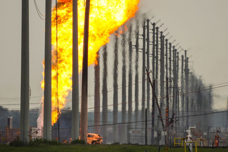 A pipeline carrying liquified natural gas burns near Spencer Highway and Summerton on Monday, Sept. 16, 2024, in La Porte, Texas. (Brett Coomer/Houston Chronicle via AP)