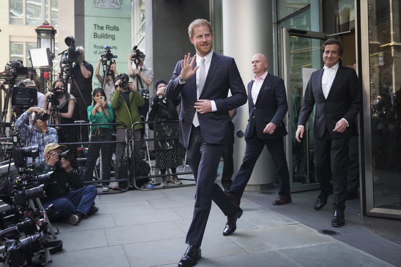 FILE - Prince Harry leaves the High Court after giving evidence in London, Wednesday, June 7, 2023. (AP Photo/Kin Cheung, File)