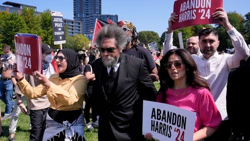 Progressive activist Cornel West watches a demonstration prior to in march to the Democratic National Convention Monday, Aug. 19, 2024, in Chicago. (AP Photo/Alex Brandon)